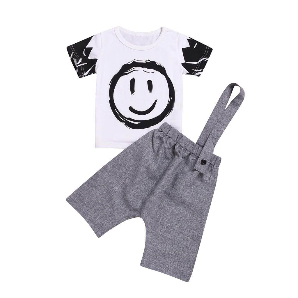 KATATA เด็กทารกวัยหัดเดินแขนสั้นของผู้หญิงเสื้อยืดลายการ์ตูน + กางเกงเอี๊ยมชุด KATATA เด็กทารกวัยหัดเดินแขนสั้นของผู้หญิงเสื้อยืดลายการ์ตูน + กางเกงเอี๊ยมชุด