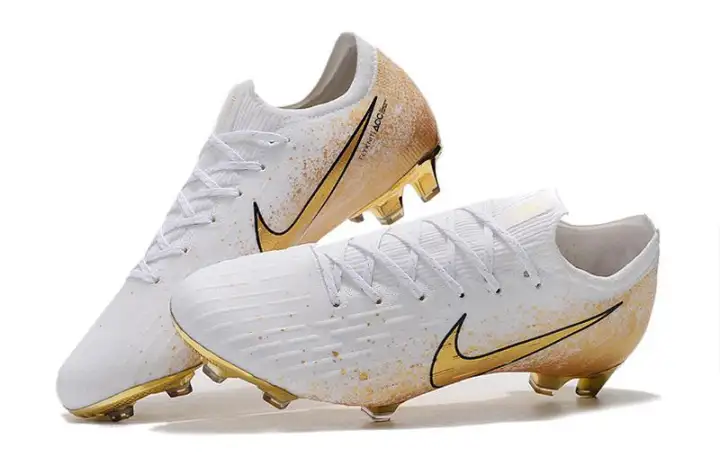 white and gold vapor cleats