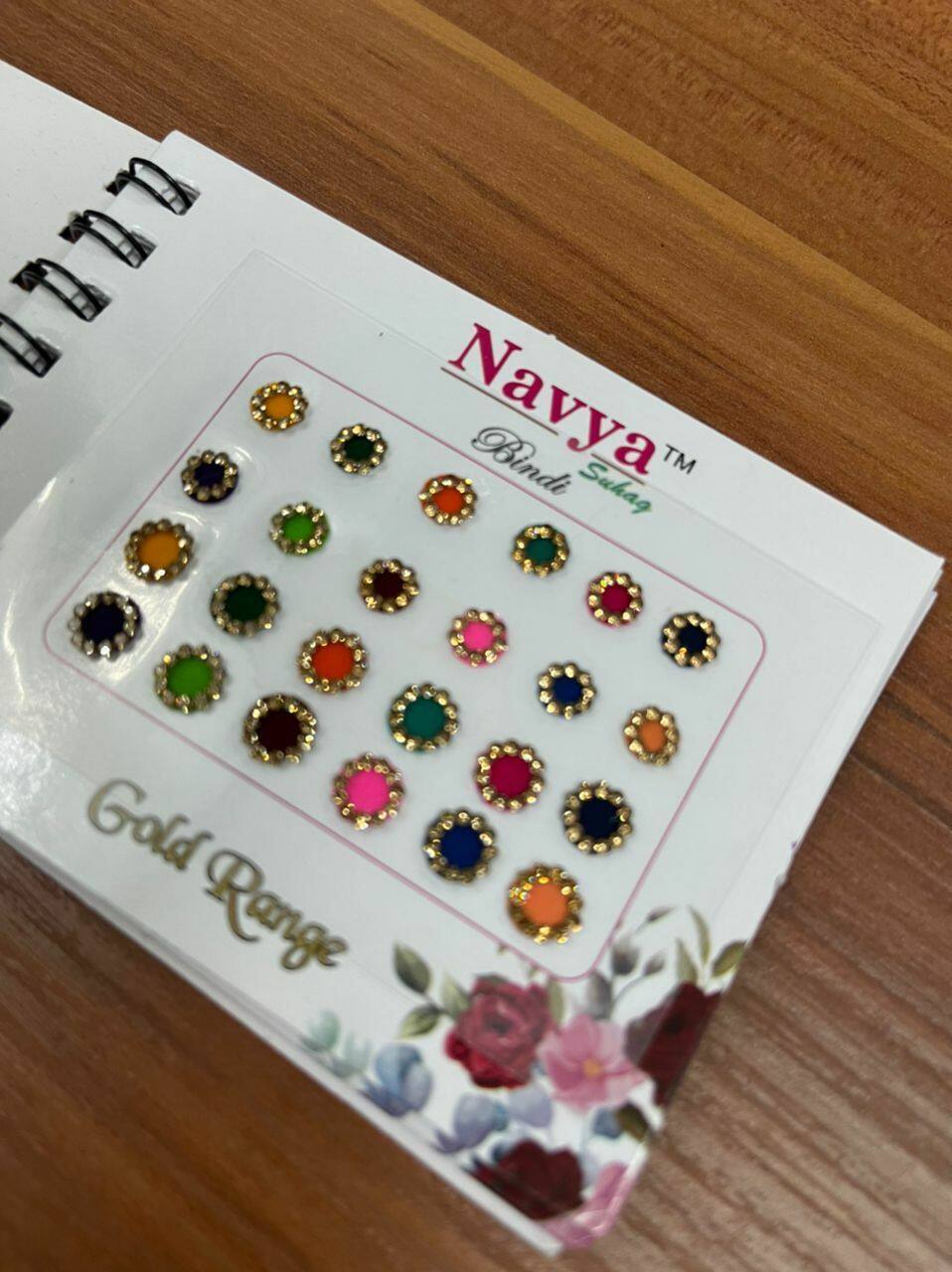 (BD63)Bindi/ Pottu/ Sticker Pottu Booklet Navya Multi color Gold Stone