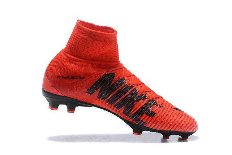 red and black football boots