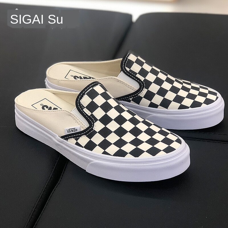half black half white slip on vans