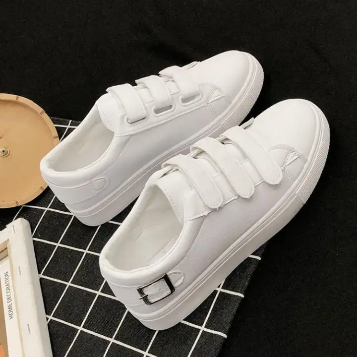 white flat sneakers