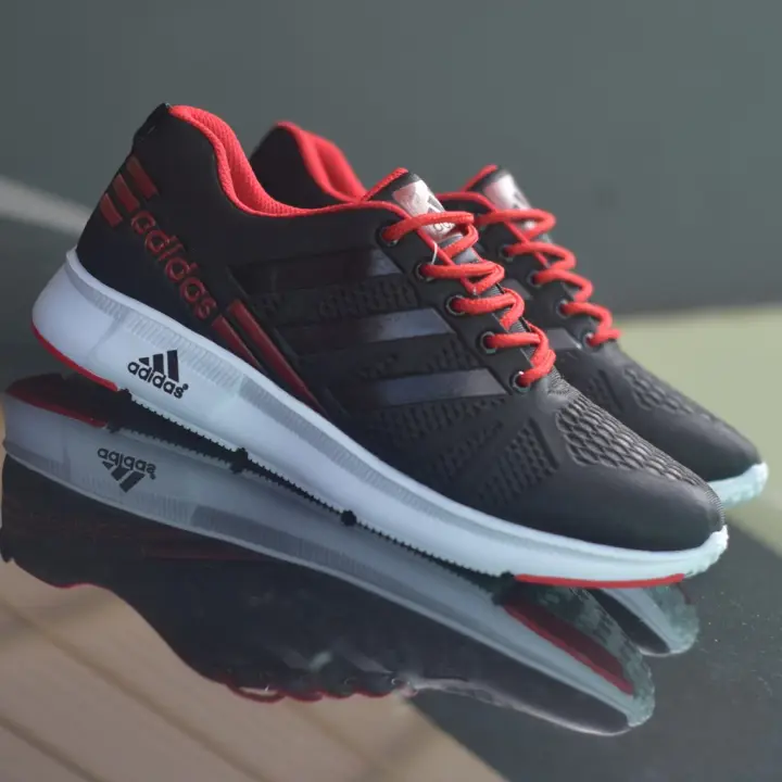 red and grey adidas shoes