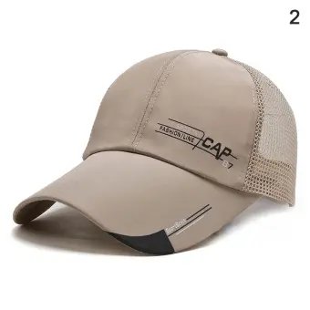 messy bun with baseball cap
