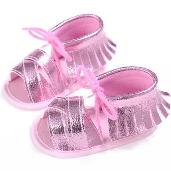 pink and blue baby shoes