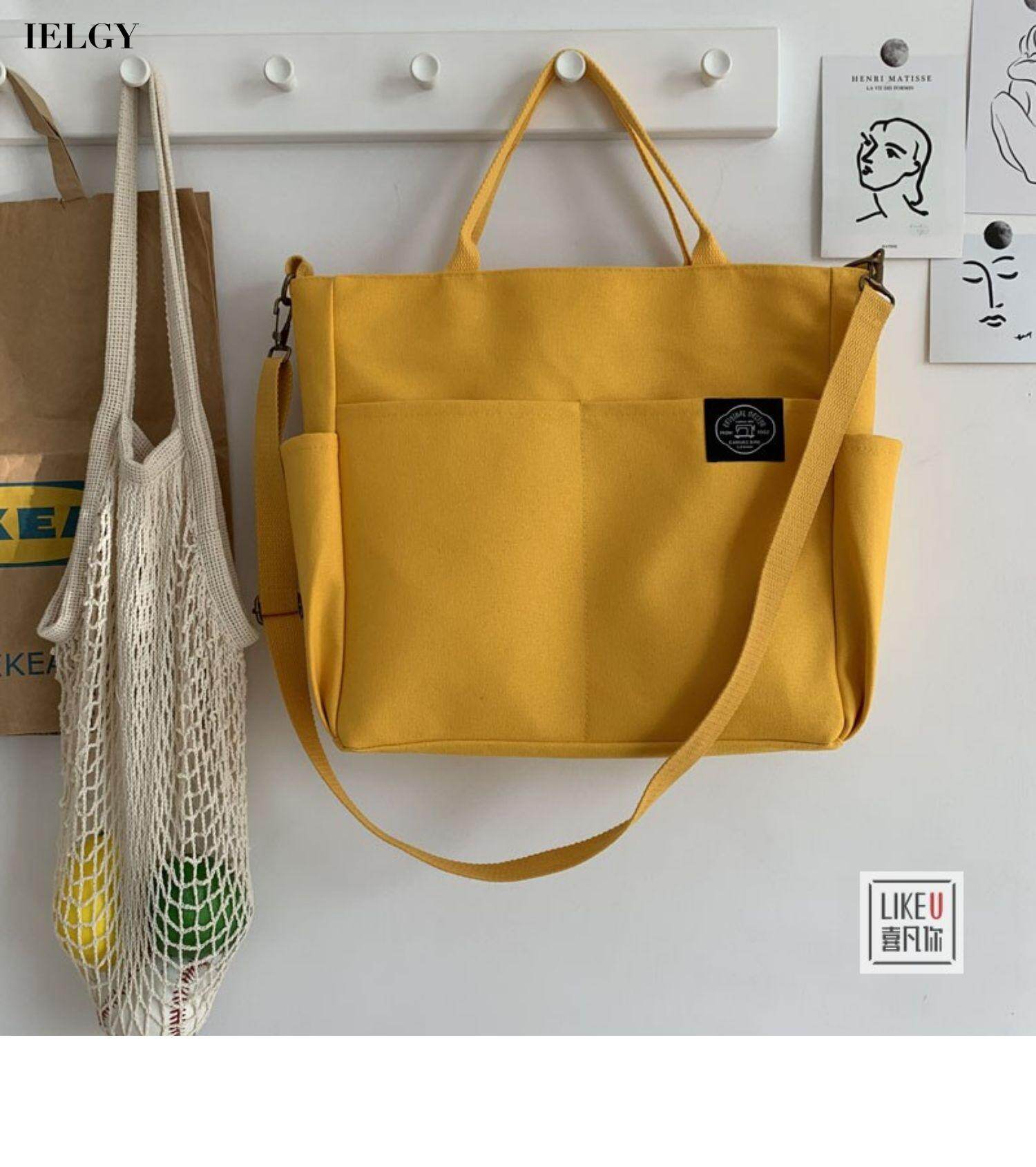 IELGY canvas shoulder bag with large compartment simple and trendy