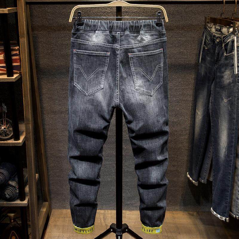 grey torn jeans