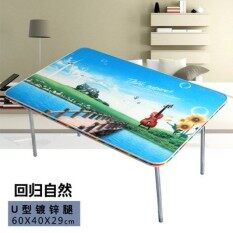 A Laptop Desk On A Computer Table In Bed