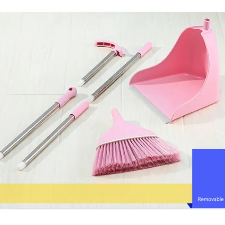 pink broom and dustpan