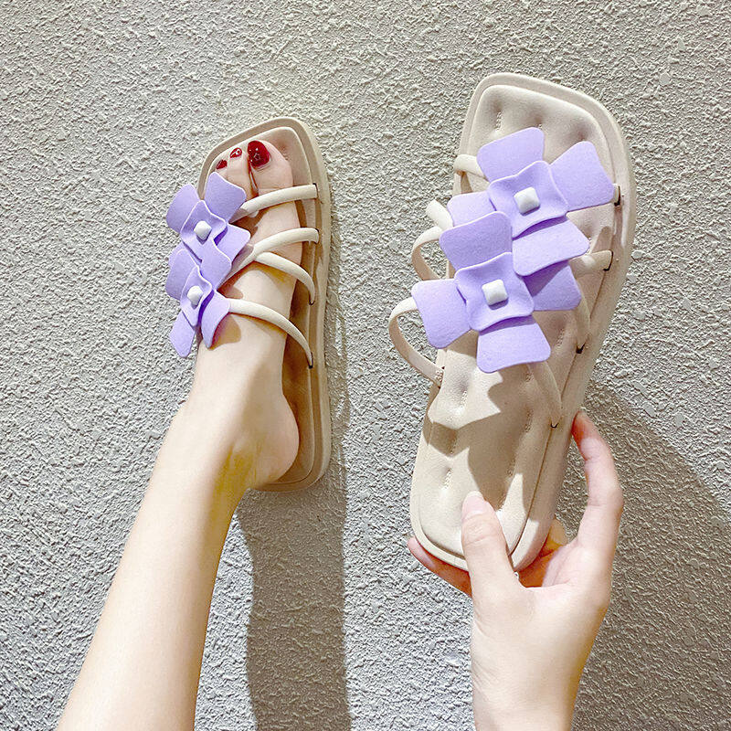 Slippers women wear beach slippers in summer 2022 Korean version of the net red ins outdoor fashion flat bottom flower one word sandals new