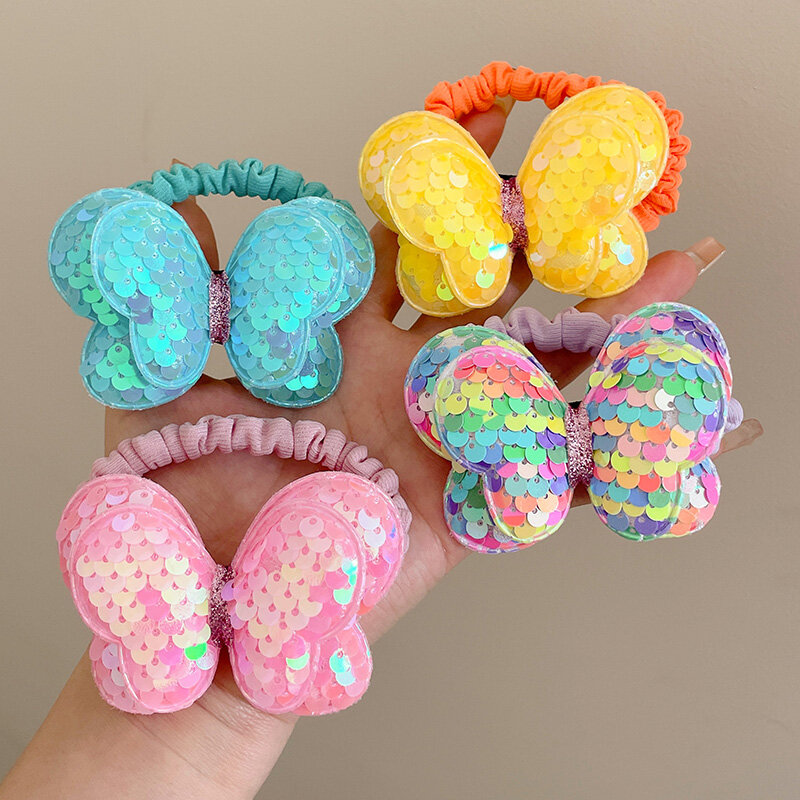 Dây buộc tóc nơ sequin dễ thương cho trẻ em