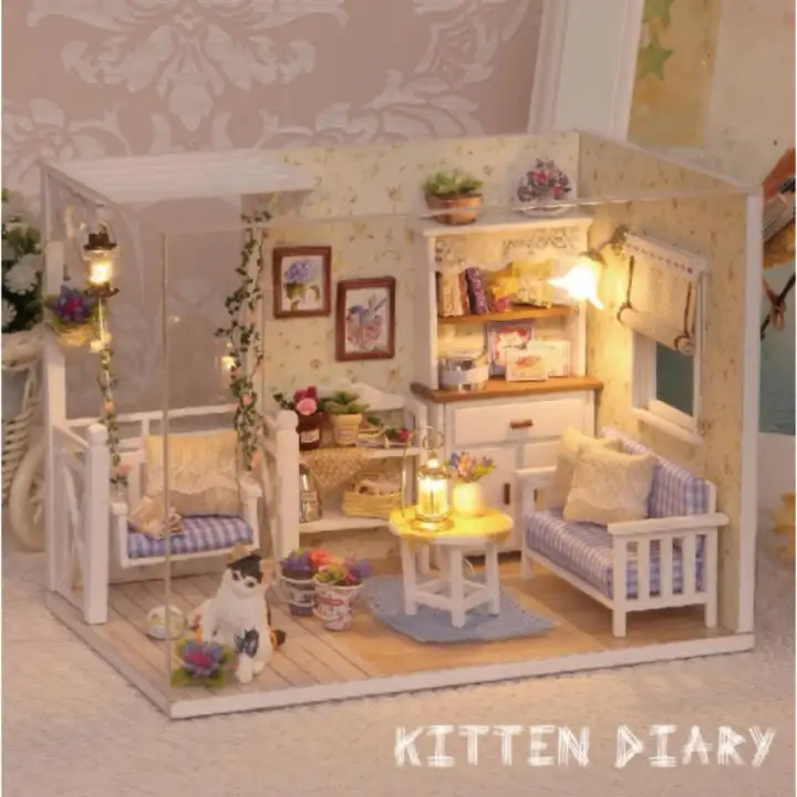 miniature house with lights
