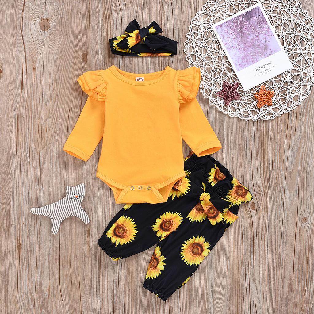 [จัดส่งฟรี] ทารกแรกคลอดชุดจั้มสูทเด็กผู้หญิงเสื้อ Sunflower กางเกงลายดอกไม้ Headband Outfits ชุด