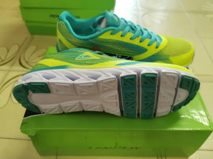 fluorescent yellow running shoes