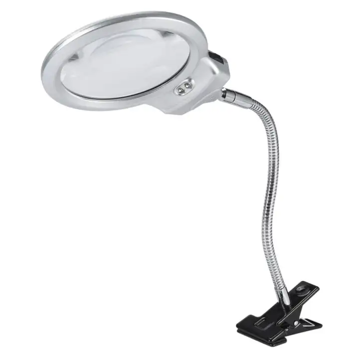 table lamp with magnifying lens