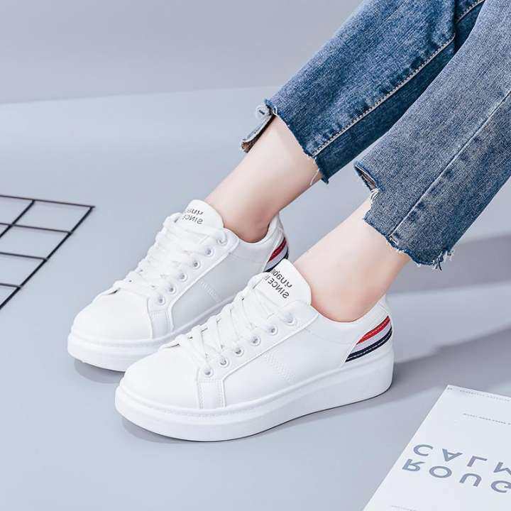 white flat sneakers