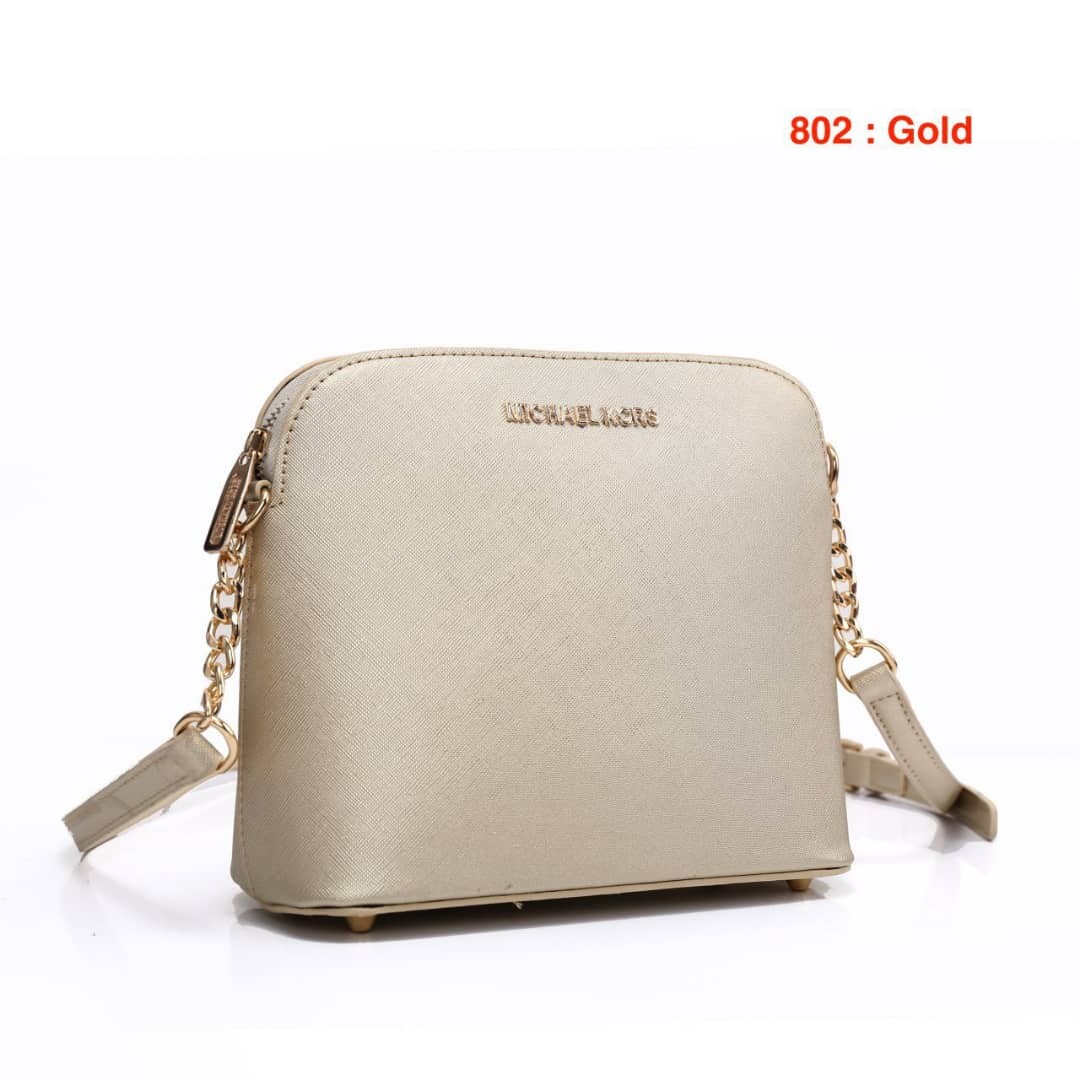 michael kors gold sling bag