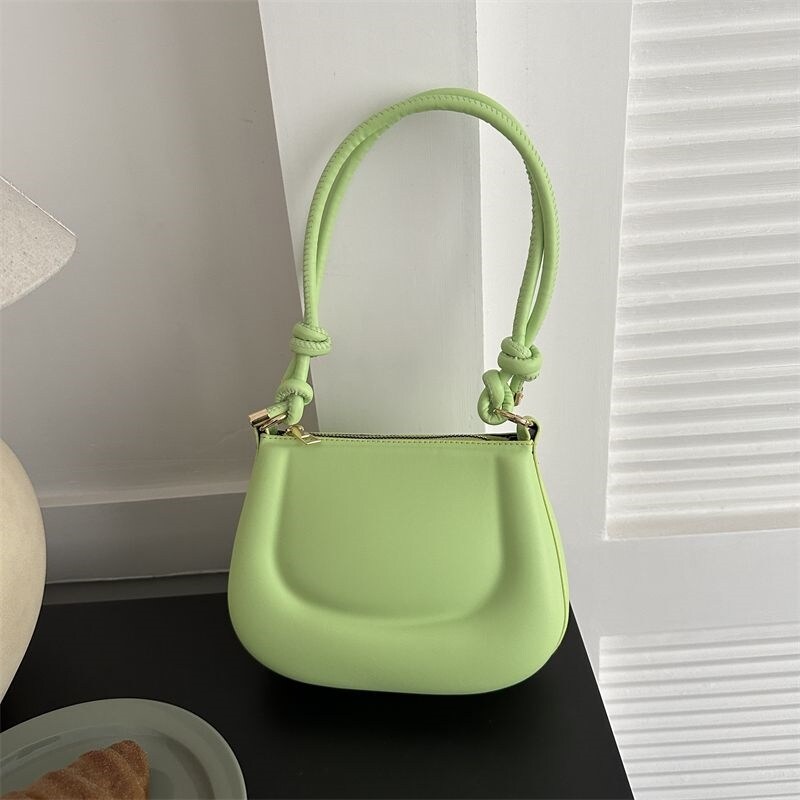 Peas package niche design senior female 2023 new cute appearance high level feeling bag handbag shoulder inclined shoulder bag