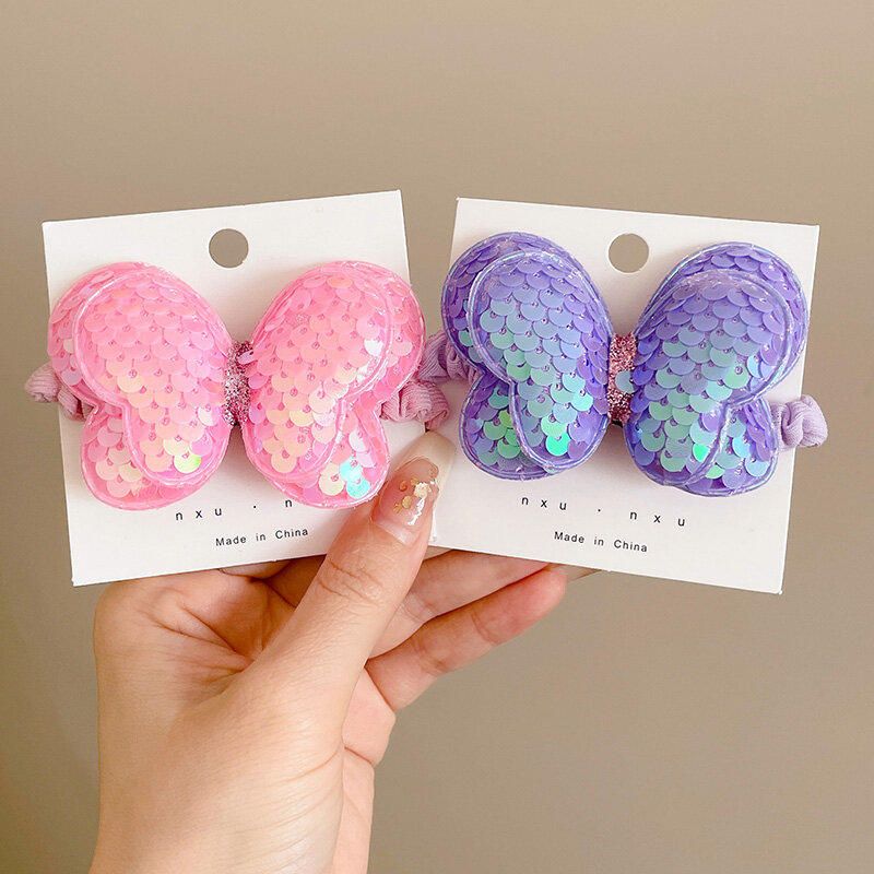 Dây buộc tóc nơ sequin dễ thương cho trẻ em