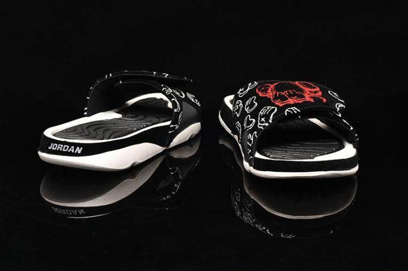 kaws jordan slides