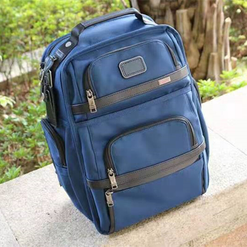 tumi business backpack