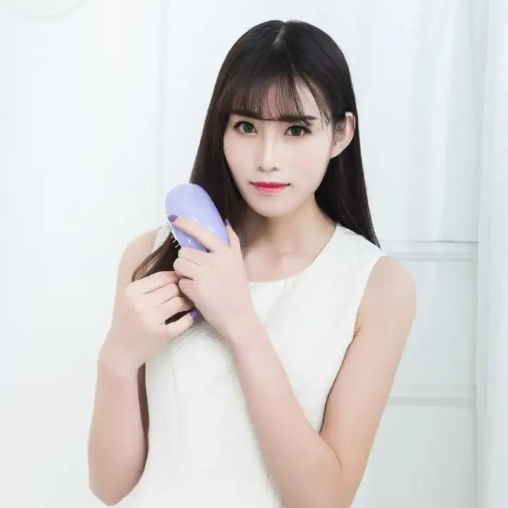Ufree Freeshipping Mini Hair Comb Electric Massage Hair Brush