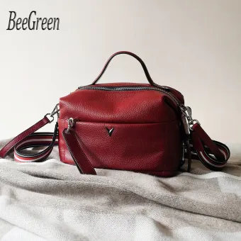 wide strap leather handbag