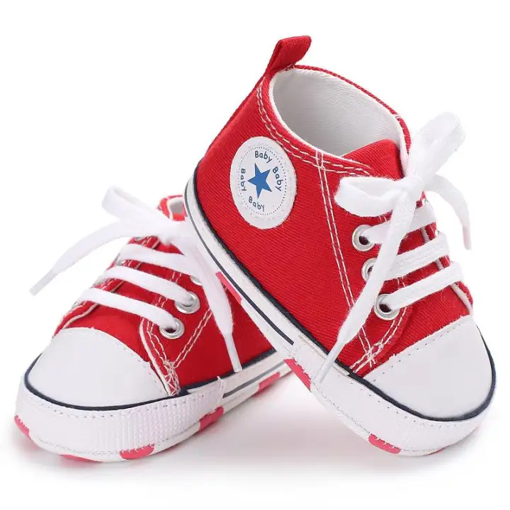 white canvas baby shoes