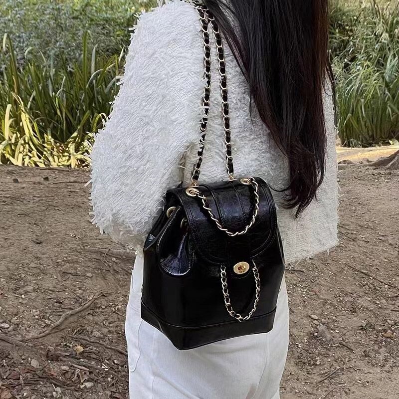 The new south Korean niche denim backpack with mini chain bucket ins blogger institute wind backpack