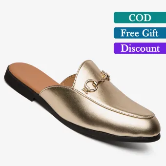 white and gold loafers