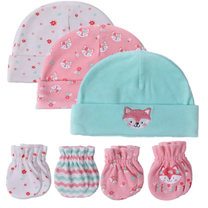 white cotton newborn hat