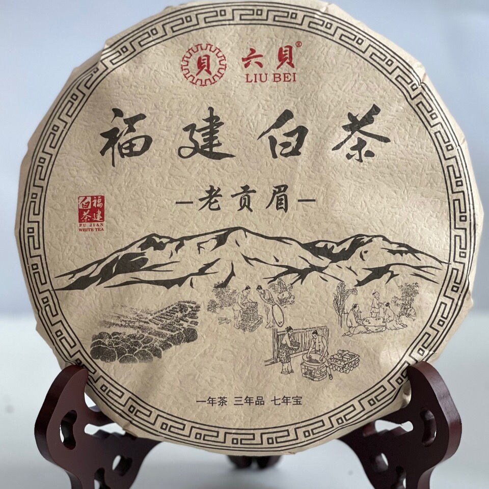 Fujian old white tea 2015 alpine old white tea aged tightly pressed Fuding 350g white tea cake