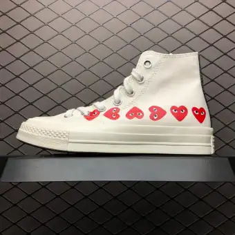 converse with red heart on side