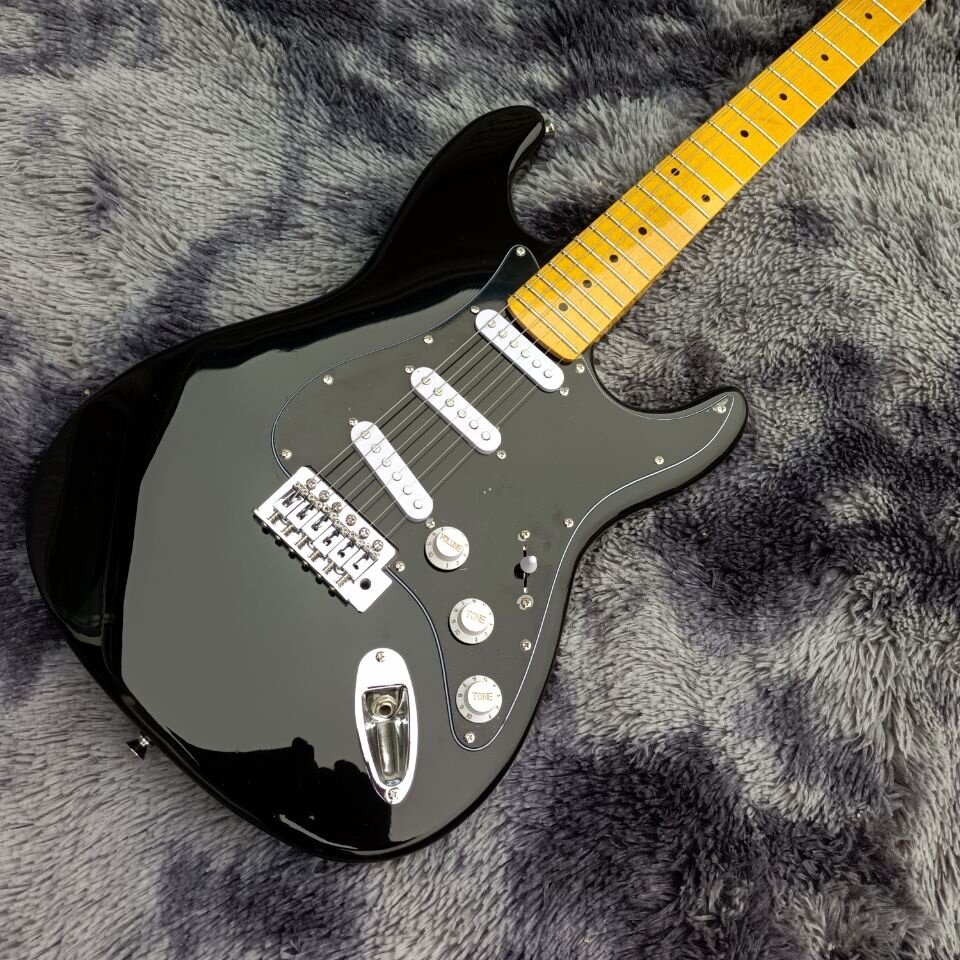 Black electric store guitar fender