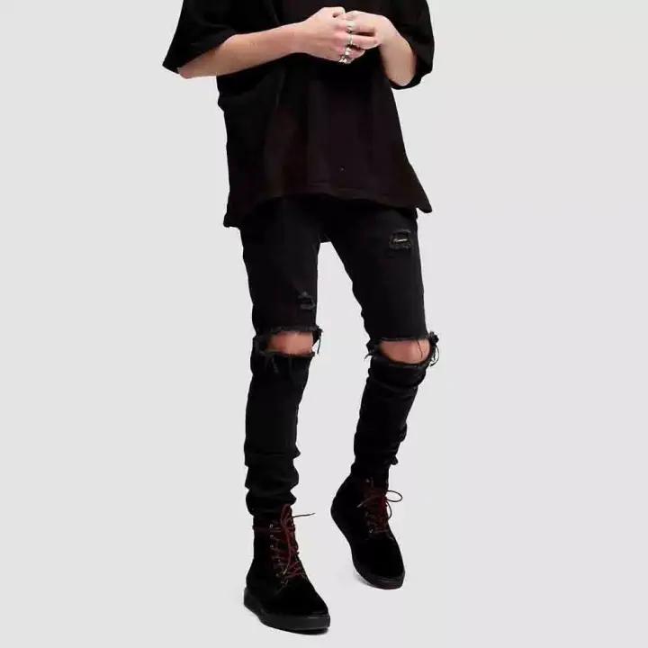 knee high boots with ripped jeans