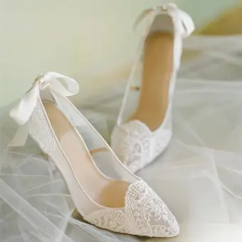 white pointed wedding shoes
