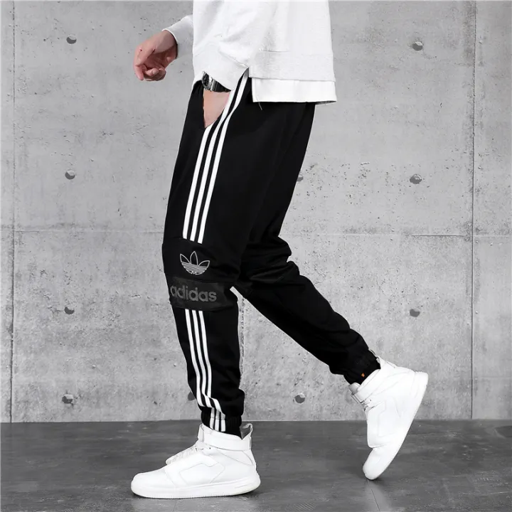white sports trousers mens