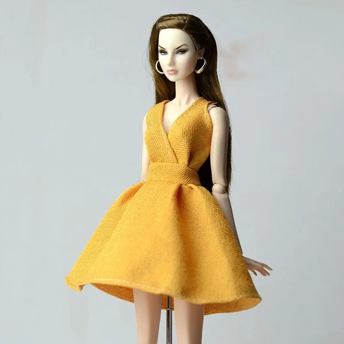 orange barbie doll