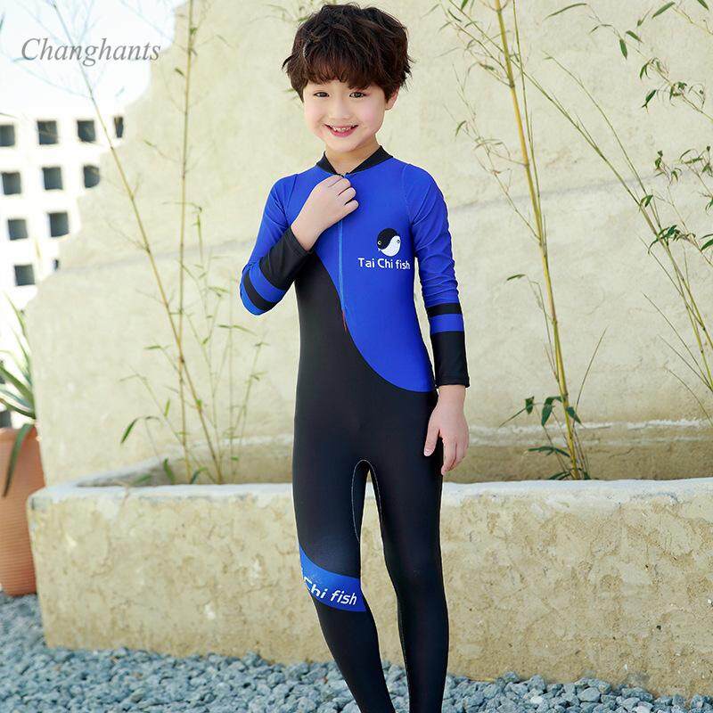 boy wearing one piece swimsuit