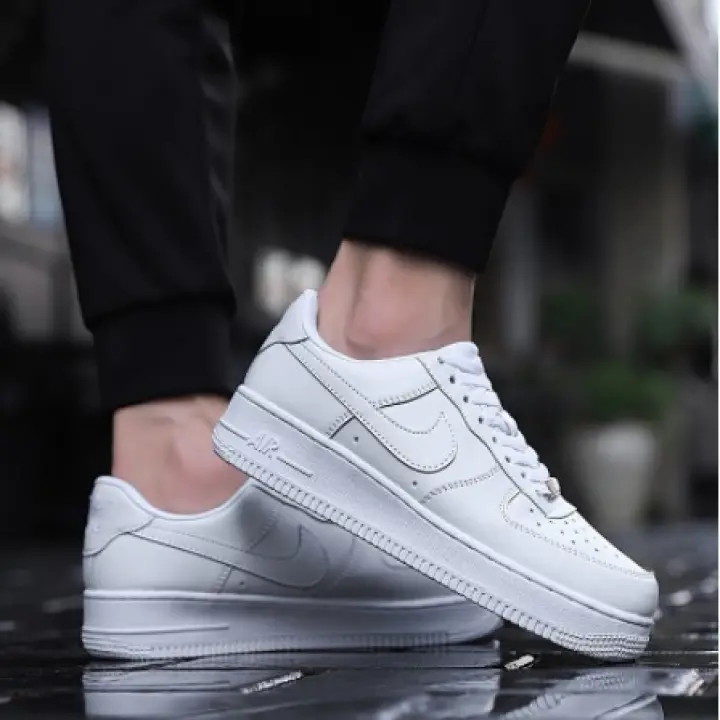 white air force with gold tick