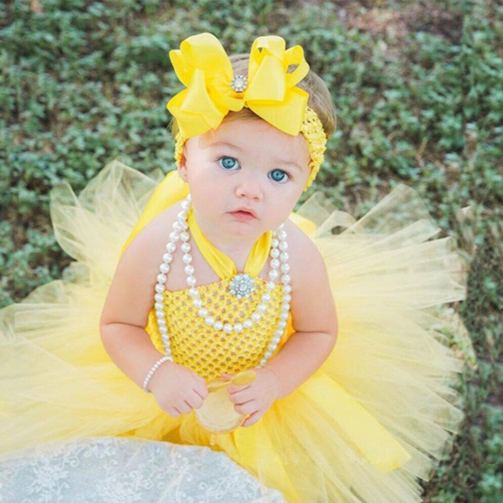 Cute baby in yellow on sale dress