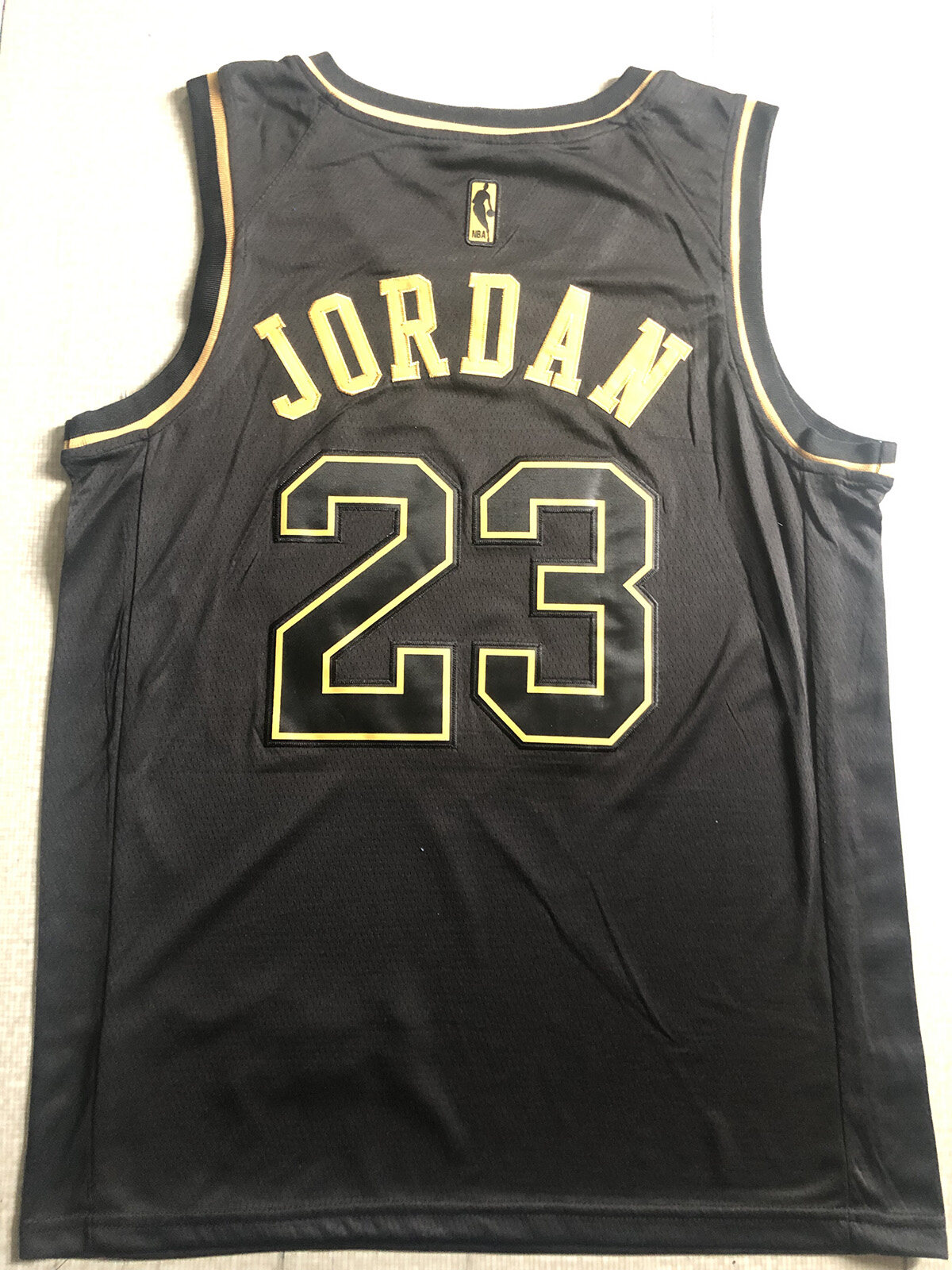 michael jordan black and gold jersey