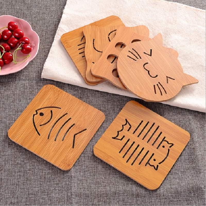 Sáng tạo hoạt hình bằng gỗ cách nhiệt Coaster dày rỗng không trượt placemat phụ kiện bàn bếp