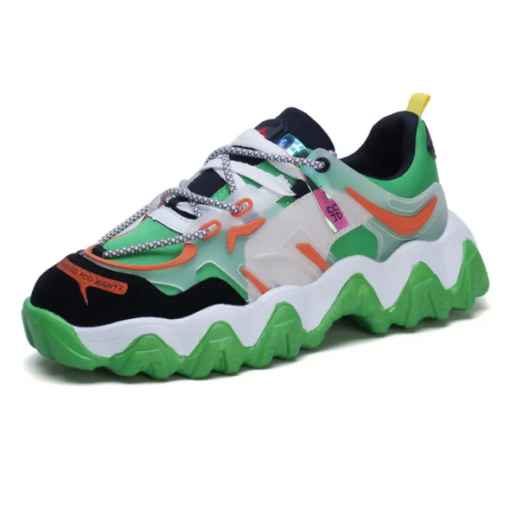 red and yellow tennis shoes