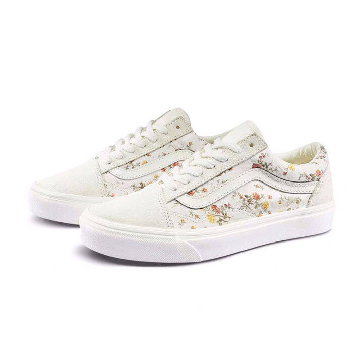 white low cut vans