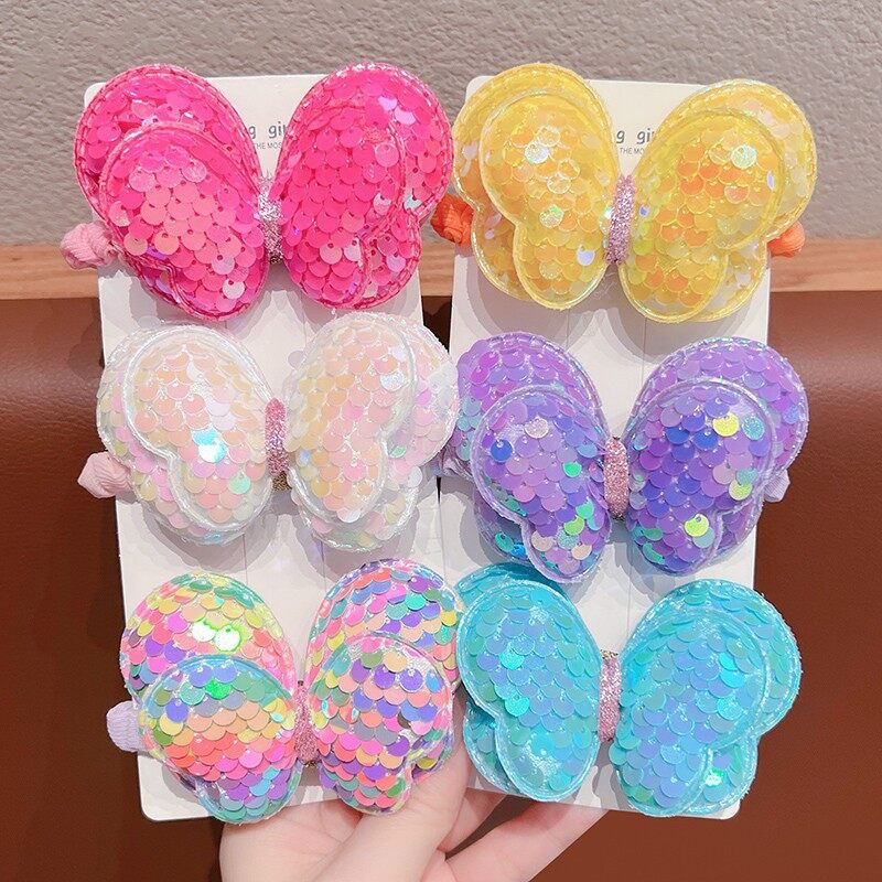 Dây buộc tóc nơ sequin dễ thương cho trẻ em