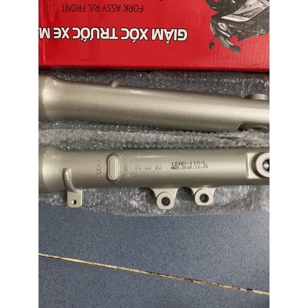 Phuộc trước Lead 110 hàng công ty