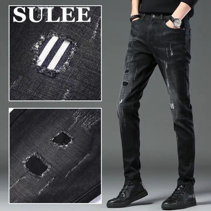 black jeans with holes