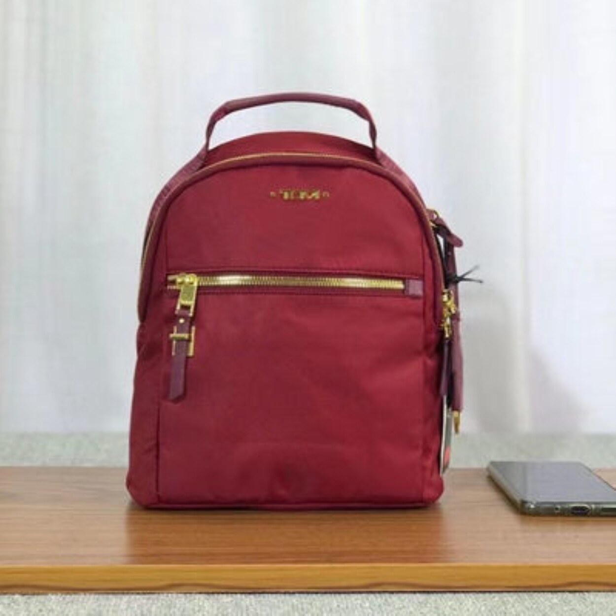 tumi backpack mini
