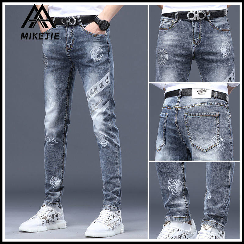 MIKEJIE Men's Summer New Embroidered Jeans Men's Small Feet Slim Jeans Light Blue Trend Trousers Ripped Patches Stretch Pants for Men